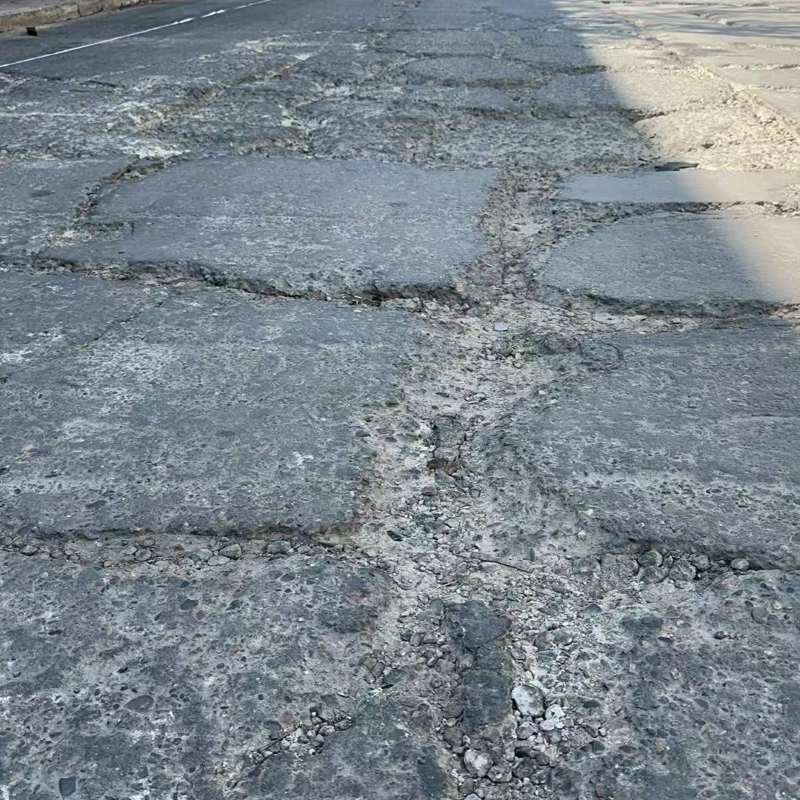 红花岗路面起砂露石子修补料